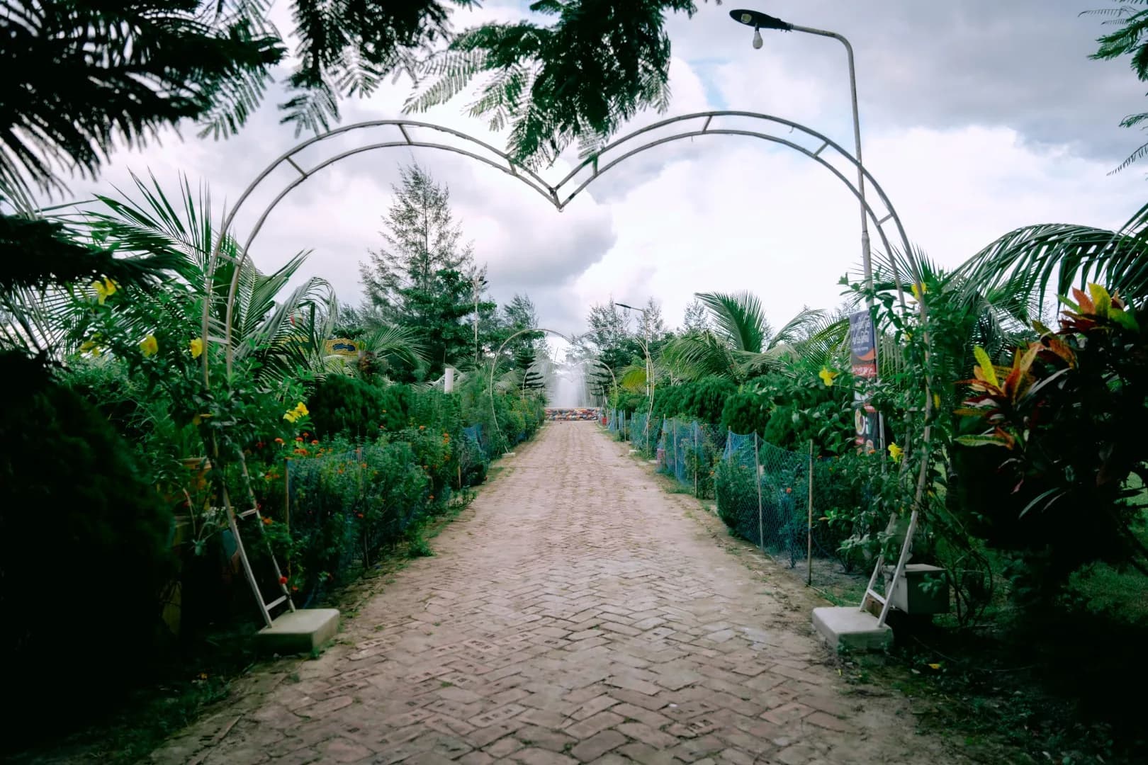 The heart-shaped arch over the garden path